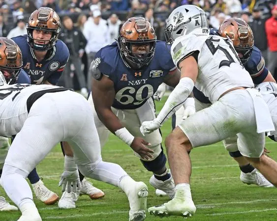 NICHOLS ANCHORS NAVY'S OFFENSIVE LINE