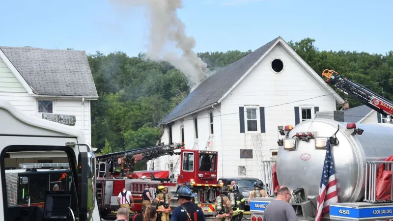 Firefighter experiences medical emergency while battling Baltimore County house fire