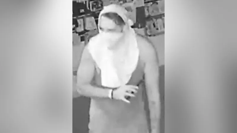 Masked man wanted after smashing door at Frederick video game store