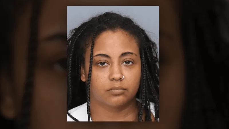 Woman accused of punching worker, pulling out gun over long wait line at Maryland store