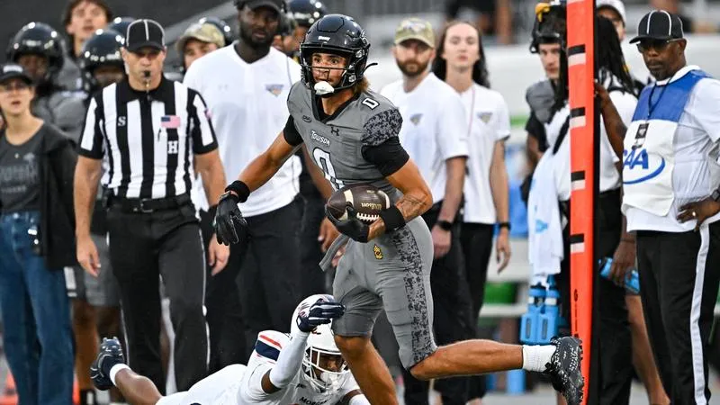 Towson Football Hosts Record Crowd But Falls in The Battle For Greater Baltimore