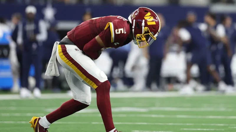 Jayden Daniels carted off after injury during first half against the Cowboys