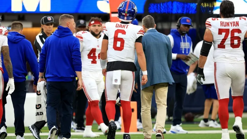 Jaxson Dart's knee injury is still being evaluated, Giants coach John Harbaugh says