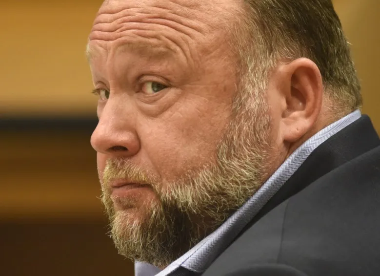 Conspiracy theorist Alex Jones files for bankruptcy in face of $1.5 billion in damages