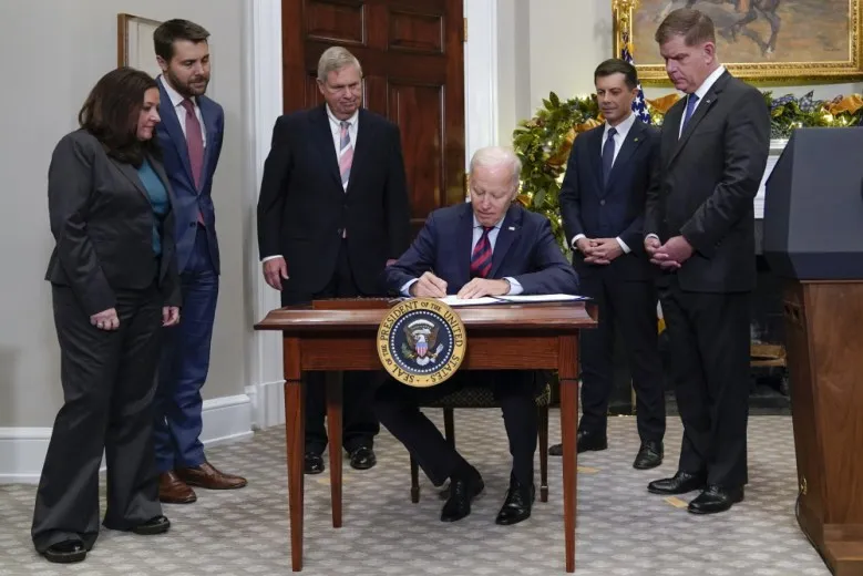 Biden signs bill to avert rail strike, says he'll work on paid sick leave