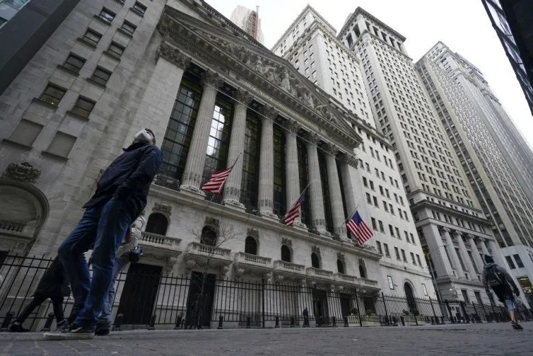 Wall Street ends mixed following strong data on wages, jobs