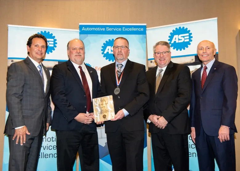Local auto technician Dennis Corson receives national award
