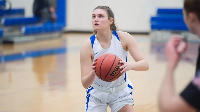 UNE escapes Western New England with 71-66 OT win