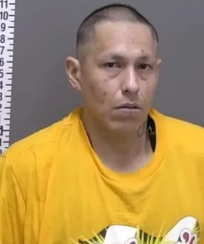 Man found hiding in a deep freeze after chase in Moorhead
