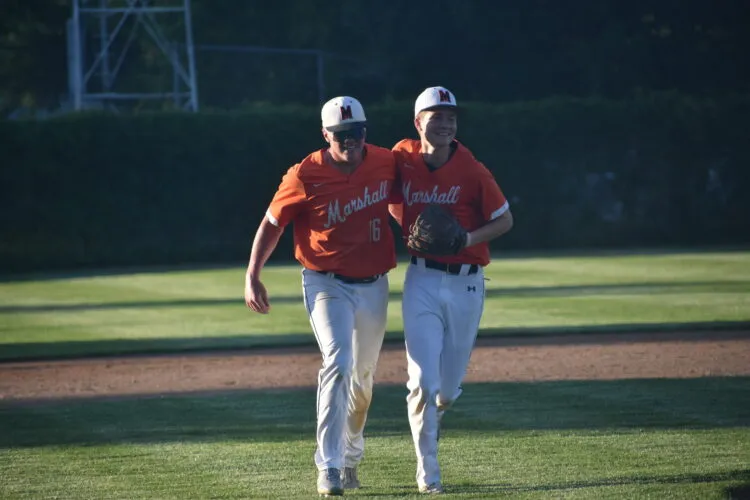 Top-seeded Tigers rally past Trojans in postseason opener