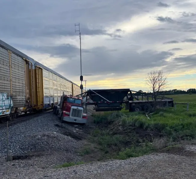 Nobody injured after semi hit by train in Wells County