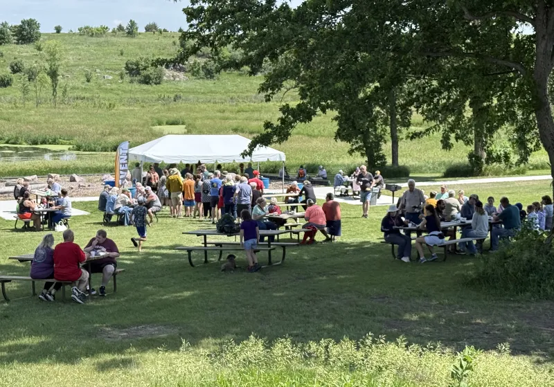 Friends of Blue Mounds serve 300 free bison burgers