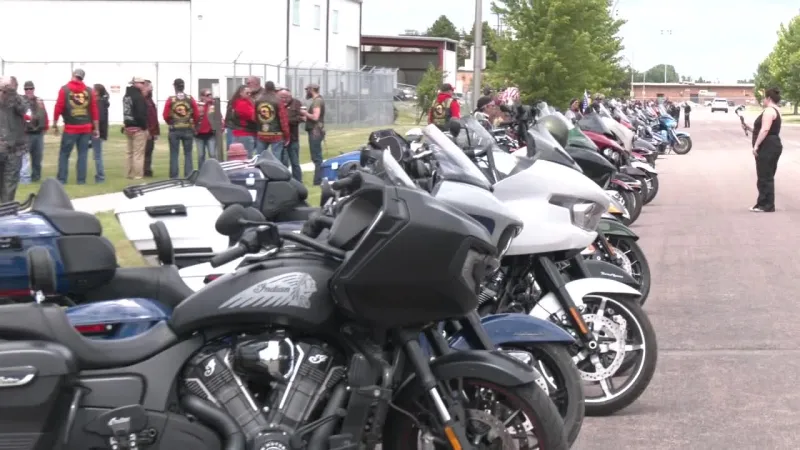 Family, friends, and motorcyclists gather to transport remains of WWII veteran