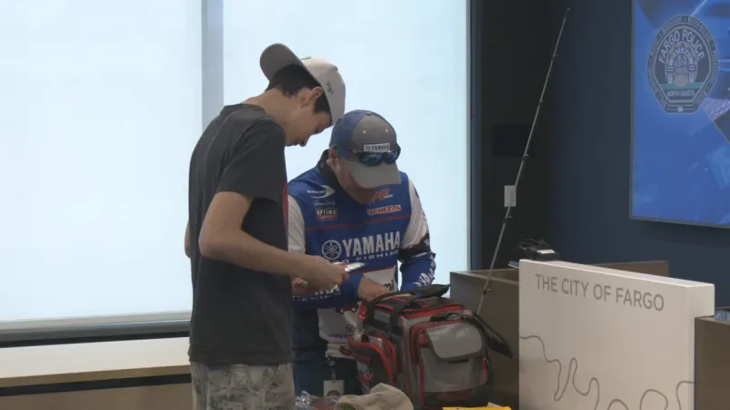 Fargo Police provide new fishing pole to area youth after someone took his while fishing