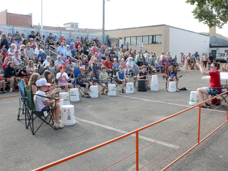Bucket drummers entertain Hot Dot Night crowds