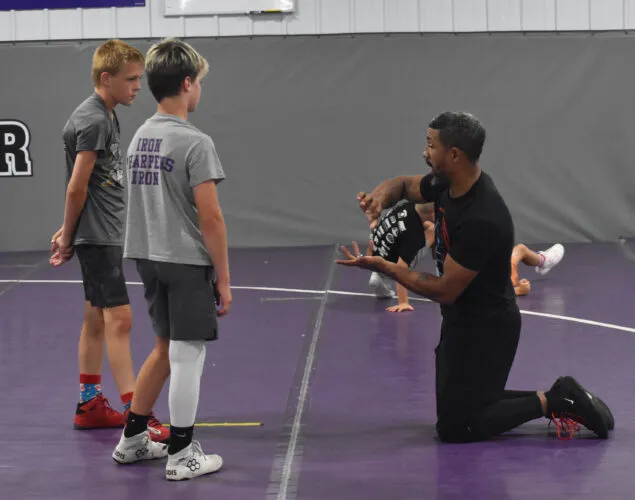 LeVesseur works with Rolling Thunder youth wrestlers