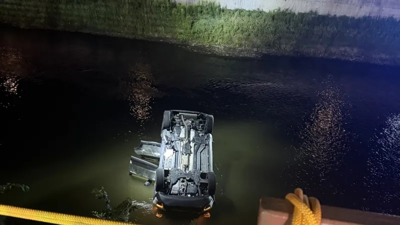 Crews rescue driver after vehicle lands upside down in Rochester river