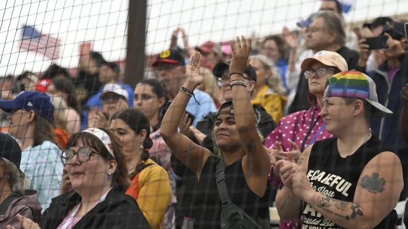 Women's Professional Baseball League makes a rainy debut in front of enthusiastic crowd