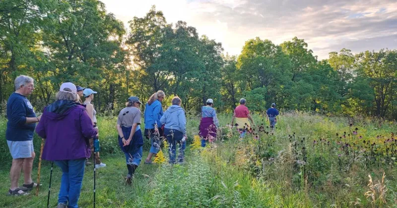 Experience an evening where gardens, blufftop sunsets, and starlit skies come together