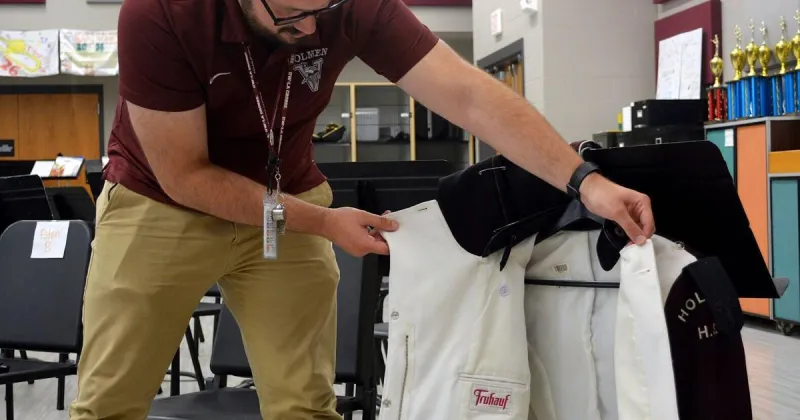 'Held together by hopes and dreams': Holmen Marching Band seeks support for new uniforms