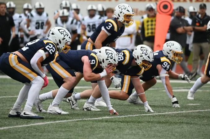 Dent Scores Twice as Football Falls to Wisconsin Lutheran in Season Opener