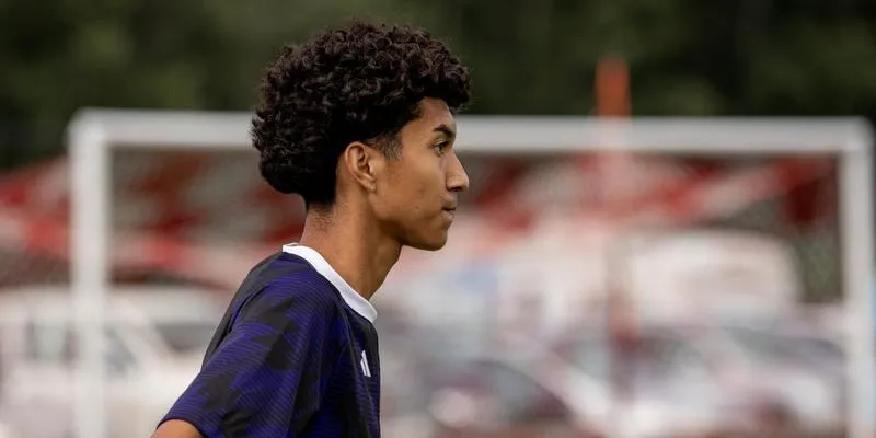 Men's Soccer Falls to Johnnies in Home Opener