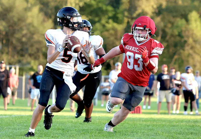 Football: Burros Blank Hurricanes, Grab Bell