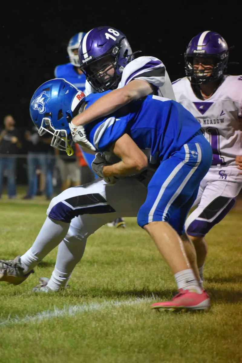 Football: Second Half Run Defense Propels GM Over M-C
