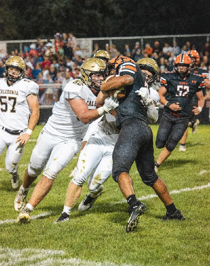 Football: Warriors Blast Saints to Improve to 2-0