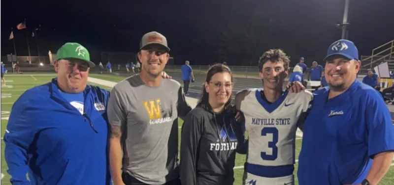 Teammates Visit KM Grad in Hospital As GoFundMe Tops $100K
