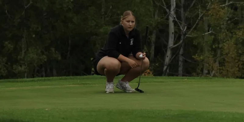 Cash Claims Medalist Honors, Men also Compete at Morris Dual