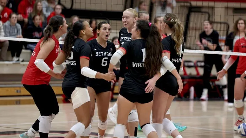 Volleyball Tops Crown in Four Sets