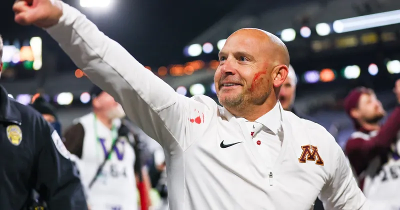 "Blood brother": Gophers coach P.J. Fleck smears linebacker's blood on his own cheek after win at Washington