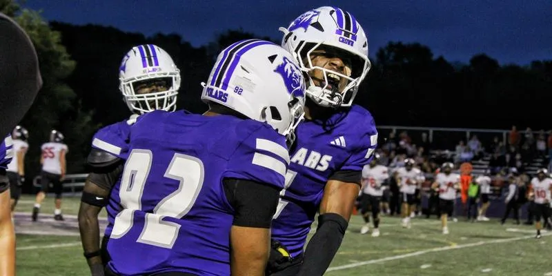 Simmons' Pick-Six Highlights Hard-Fought Battle as Crown Falls to Westminster