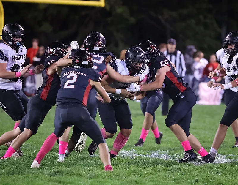 Football: Lions Hold Off Knights