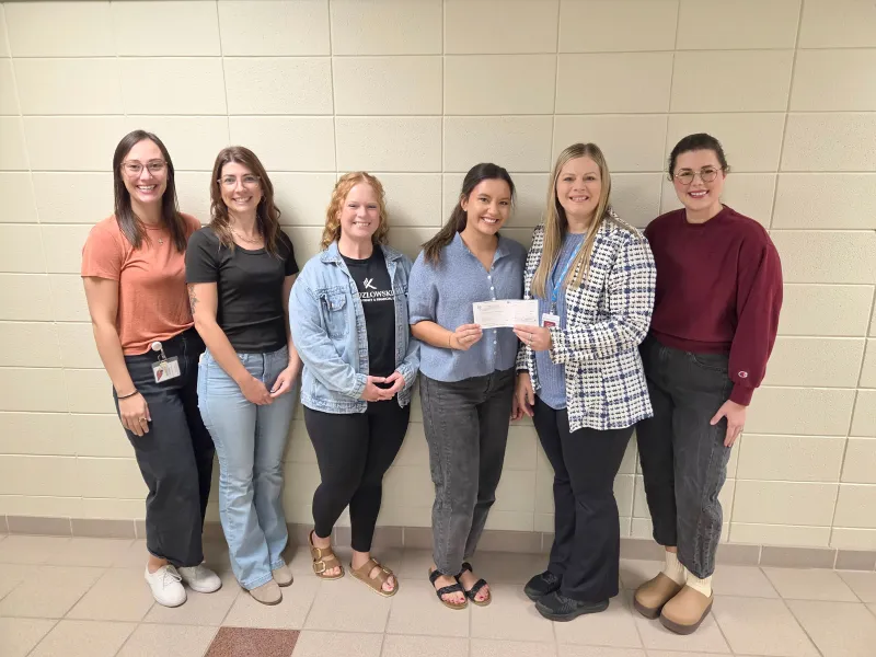 Kozlowski Insurance donates to S.H.A.R.E.