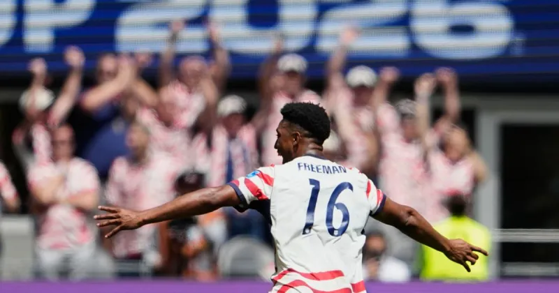 U.S. reaches World Cup knockout round, wins group with 2nd straight victory, 2-0 over Australia