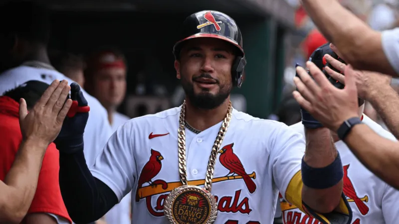 Reds beat Cardinals 5-3 in 10 innings to win three straight road series