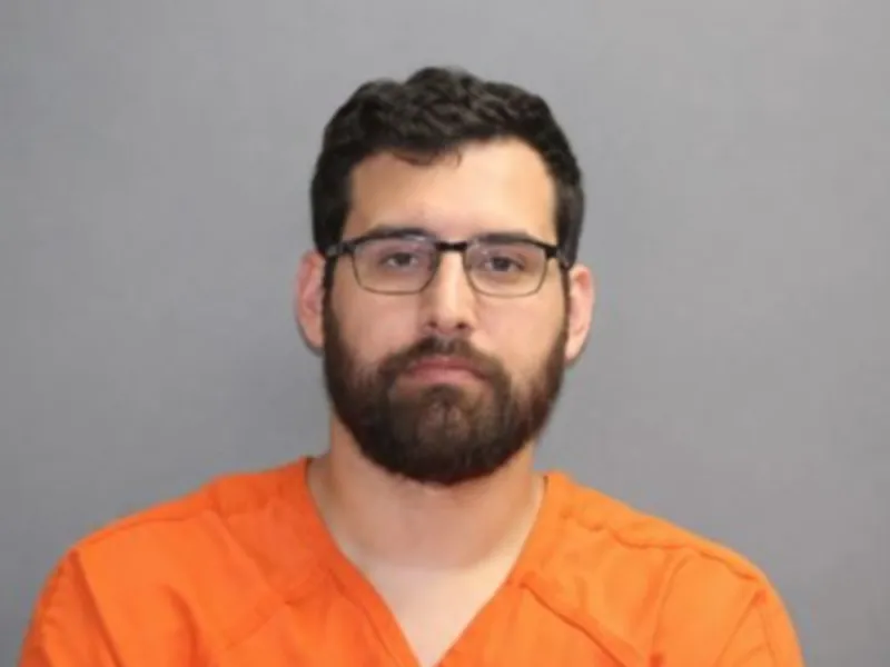 Parsons police officer accused of secretly filming juvenile in bathroom