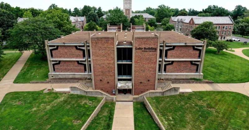 Webster commission skeptical of university request to demolish historic library