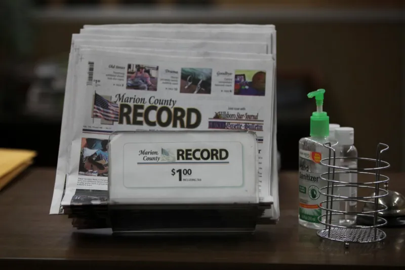 A Kansas town will pay $850K to end a reporter's lawsuit over a 2023 raid on her paper's offices
