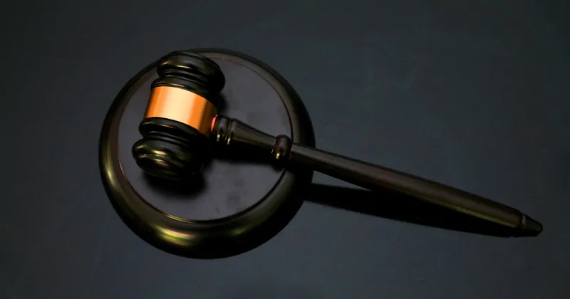 Alton man awaiting shooting retrial convicted of harassing witness