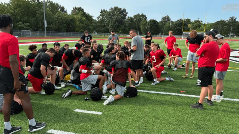 Local high school football teams brave the heat, while some move inside