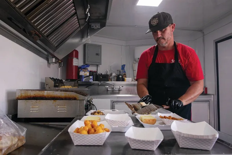 Heat is On: Steamy summer temps test food truck staff stamina