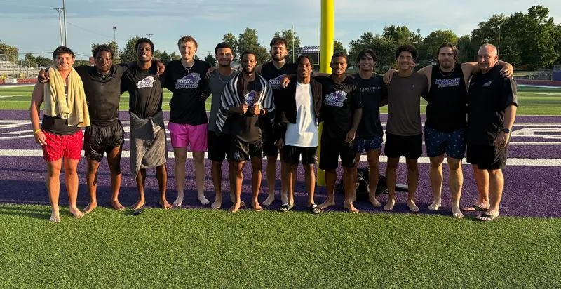 Twelve Bearcat Football Athletes Publicly Declare Faith Through Baptism
