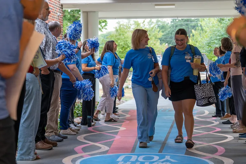 Alliance students start class with cheers, high fives