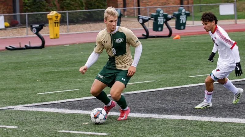 Banasik's Two Goals Give Miners 2-1 Win in Season Opener