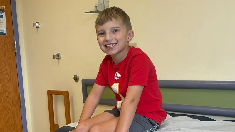 Football Helps Grant Caleb's Wish at Home Opener