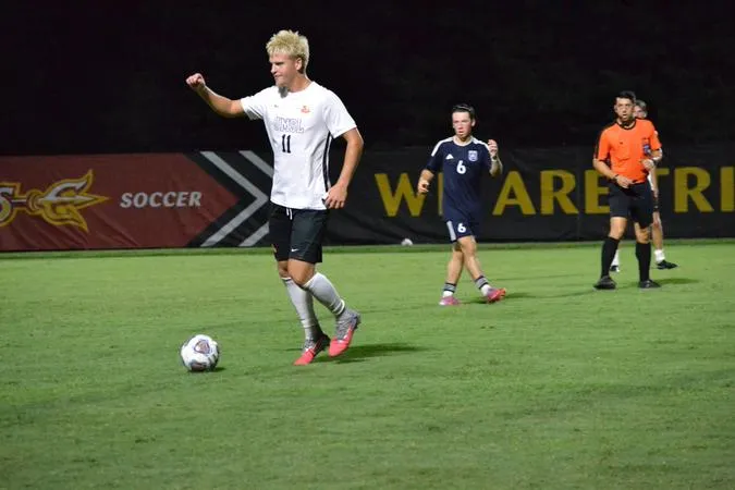 Men's Soccer Secures First Conference Win
