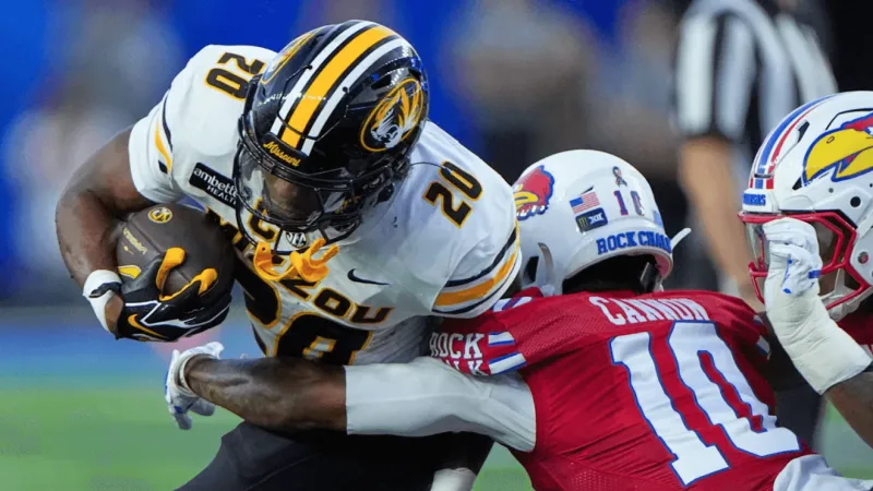 Woodyard's 2 second-half takeaways swing Border War as No. 23 Missouri beats Kansas 38-21